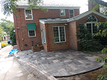 Poured colored concrete pavers with fishtail finish