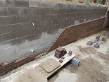 Rebuilt 170 linear ft retaining wall