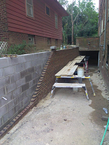 Rebuilt 170 linear ft retaining wall