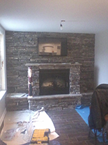 Faux stone fireplace